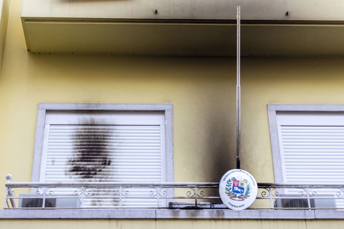 Damage to the Venezuelan consulate in Lisbon, Portugal, is seen Sunday.