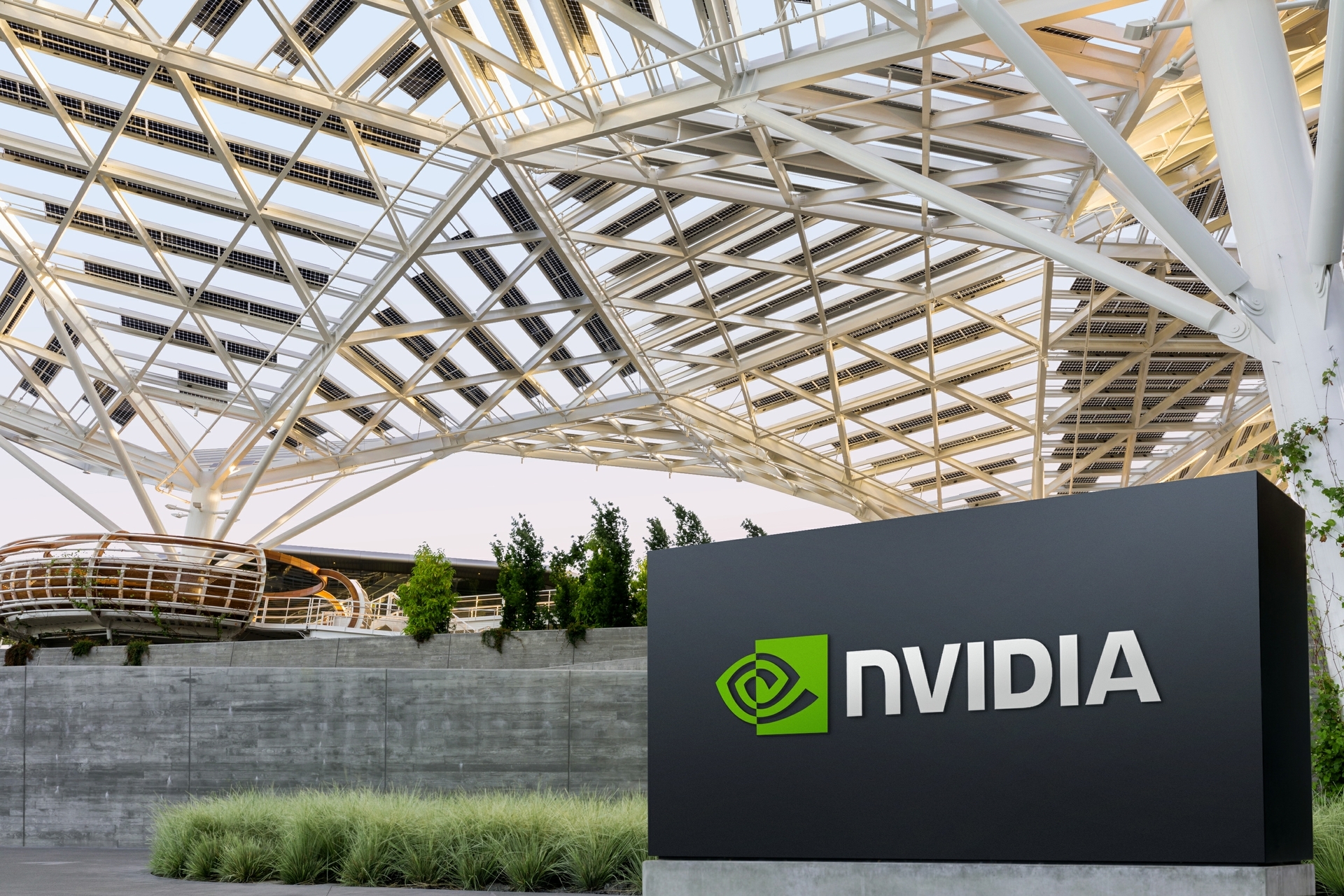 Nvidia stock rises despite market turmoil as strong earnings, bullish analysts, and GTC 2026 anticipation attract investors.